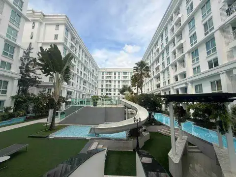 2 Bedroom Condo for Rent at The Orient Resort & Spa outdoor pool with water slide and courtyard view