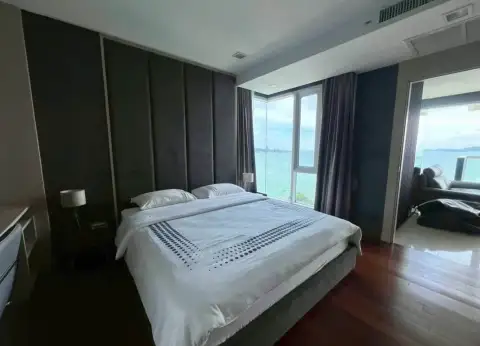 2 Bedroom Condo for Rent at Palm Wongamat master bedroom with sea view through large windows