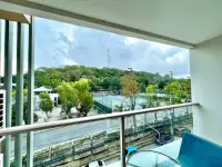 1 Bedroom Condo for Sale at The Place Pratumnak balcony view overlooking tennis courts and green hillside