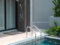 3 Bedroom House for Sale at The Prospect outdoor shower and pool ladder surrounded by greenery