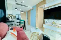 1 Bedroom Condo for Rent at The Riviera Jomtien view of kitchen counter and hallway from living room
