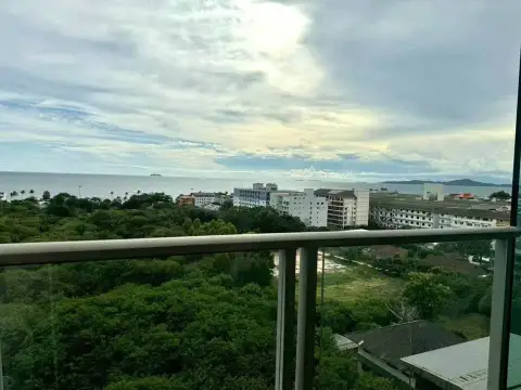 1 Bedroom Condo for Sale at The Riviera Jomtien balcony view of sea, coastline and green surroundings