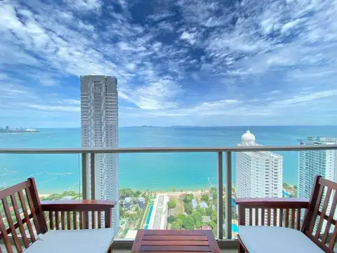 2 Bedroom Condo for Sale at The Riviera Jomtien balcony seating area overlooking Pattaya coastline