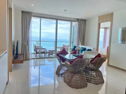 2 Bedroom Condo for Sale at The Riviera Jomtien balcony view of high-rise tower and turquoise sea