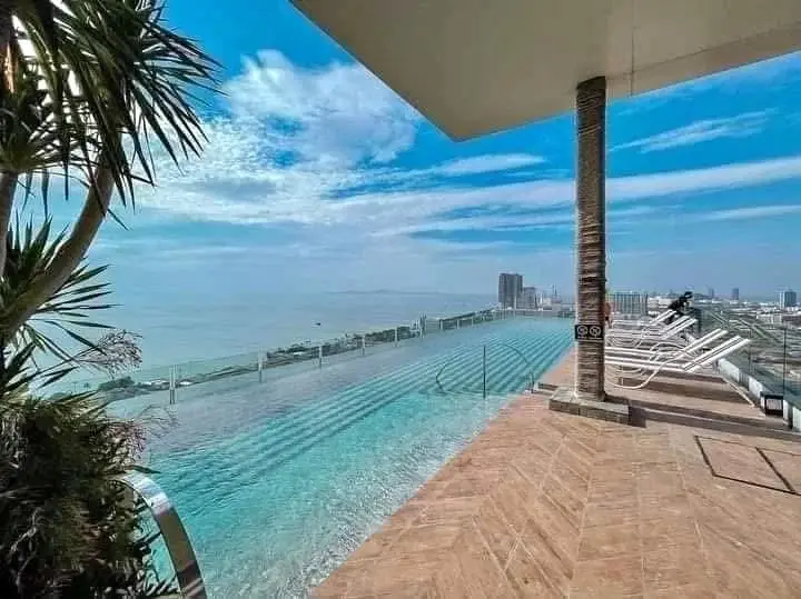 1 Bedroom Condo for Sale at The Riviera Jomtien rooftop infinity pool with panoramic sea and city view