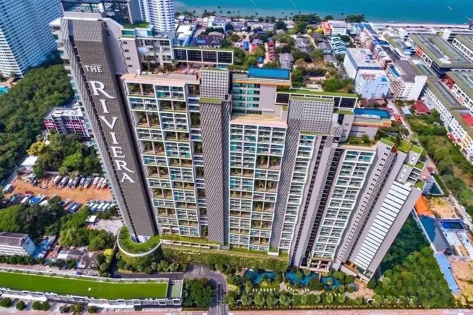 1 Bedroom Condo for Sale at The Riviera Jomtien aerial view of high-rise towers near the beach