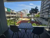 2 Bedroom Condo for Sale at The Senate Residences private balcony with outdoor table, chairs and city skyline view
