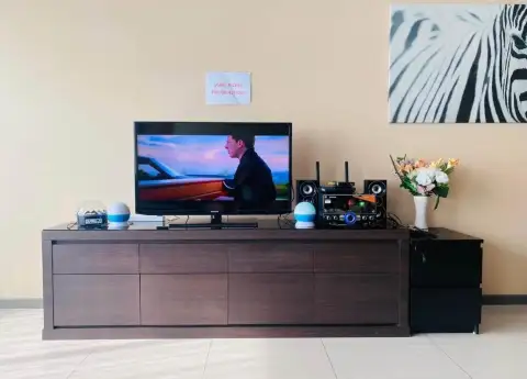 3 Bedroom House for Rent at The Ville Jomtien entertainment unit with TV, sound system, and zebra wall art