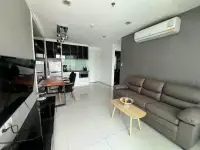 1 Bedroom Condo for Sale at The Vision open-plan living area with sofa, kitchen, and dining nook