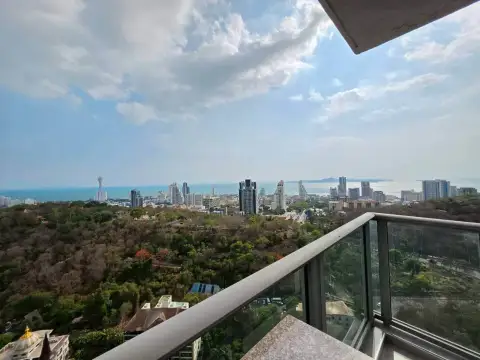 2 Bedroom Condo for Rent at Unixx South Pattaya high-rise balcony overlooking Pattaya skyline and sea