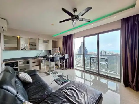 2 Bedroom Condo for Rent at Unixx South Pattaya open-plan kitchen and living area with panoramic sea view windows