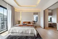 4 Bedroom House for Sale at Chieftain master bedroom with king-size bed, cove ceiling lighting, and balcony access