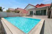 3 Bedroom House for Sale at Royal Prestige private rectangular swimming pool with tiled deck and red-roof facade