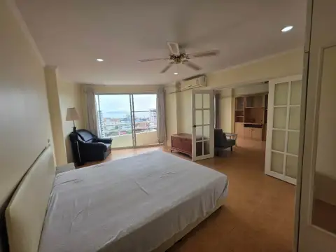 1 Bedroom Condo for Rent at View Talay 1 spacious bedroom with city view windows and seating area