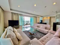 1 Bedroom Condo for Sale at View Talay 5D living room with pink sofas and balcony access