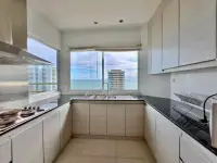 1 Bedroom Condo for Sale at View Talay 5D kitchen with granite counters and sea view window
