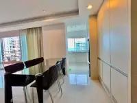 1 Bedroom Condo for Sale at View Talay 5D dining area with black table and kitchen view