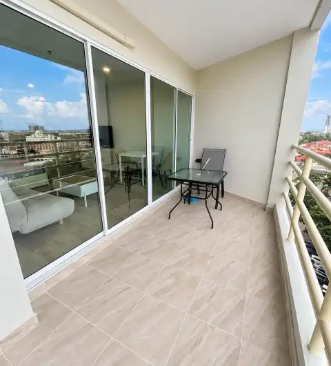 Studio Condo for Rent at View Talay 5D private balcony with table, chairs and city view