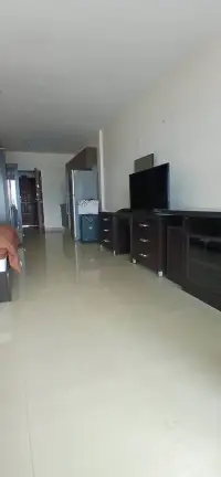 1 Bedroom Condo for Sale at View Talay 6 hallway with tiled flooring, TV console, and entrance door