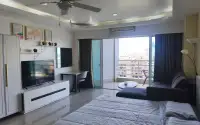 Studio Condo for Sale at View Talay 6 bedroom with TV unit, wardrobe, desk and ceiling fan