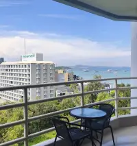 Studio Condo for Sale at View Talay 6 balcony with seating overlooking Pattaya Bay and coastline