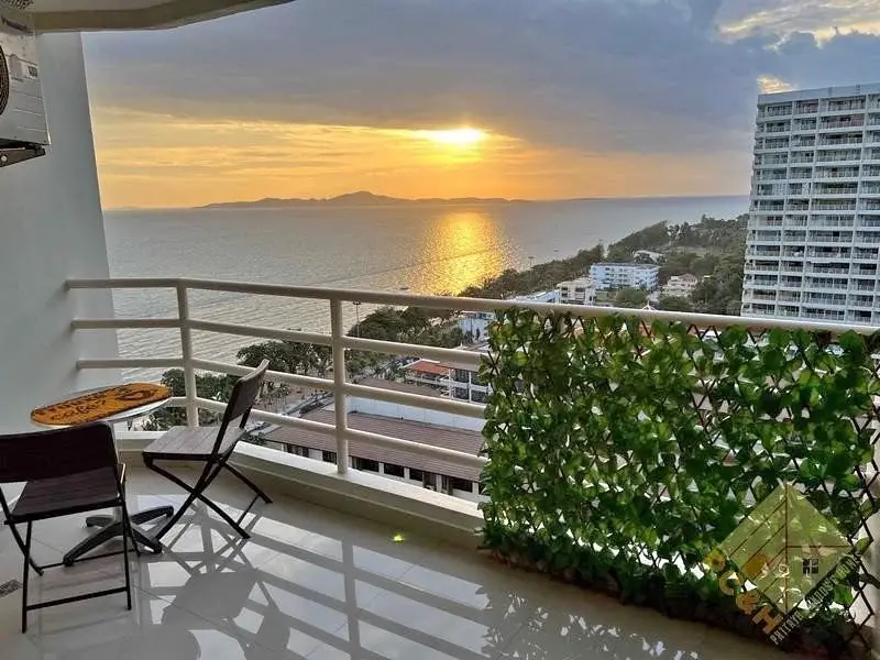 1 Bedroom Condo for Sale at View Talay 7 balcony with seating area overlooking sunset and ocean view
