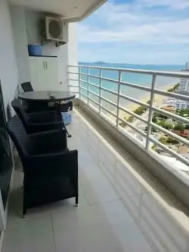 Studio Condo for Rent at View Talay 8 private balcony with rattan seating and panoramic ocean view