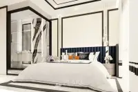 2 Bedroom Condo for Sale in The Embassy Jomtien master bedroom with king-size bed