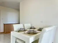 2 Bedroom Condo for Sale at Whale Marina dining table set with teacups and white leather chairs