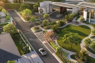 Windemere aerial view of tree-lined streets and landscaped park within the community