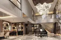 5 Bedroom House for Sale at Windemere double-height living room with grand piano, staircase and chandelier
