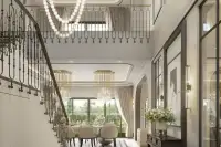 4 Bedroom House for Sale at Windemere double-height foyer with wrought-iron staircase and dining area view