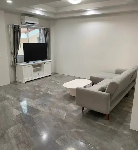 3 Bedroom House for Rent at Wonderland II spacious lounge with sofa, TV console, and polished marble floor