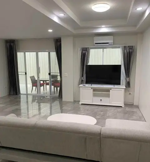 3 Bedroom House for Rent at Wonderland II open-plan living area with flat-screen TV and marble flooring