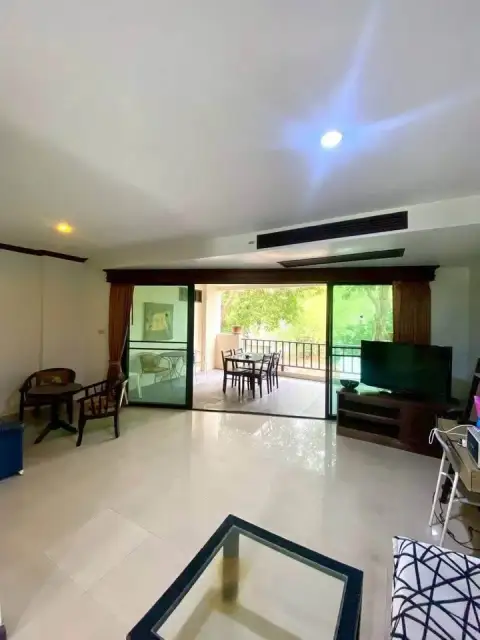 1 Bedroom Condo for Sale at Wongamat Privacy open living and dining area with balcony view