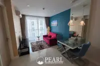 1 Bedroom Condo for Sale in Grande Caribbean living room with sofa