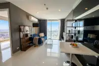 1 Bedroom Condo for Sale at The Vision modern kitchen with white cabinets, granite countertop, and appliances.