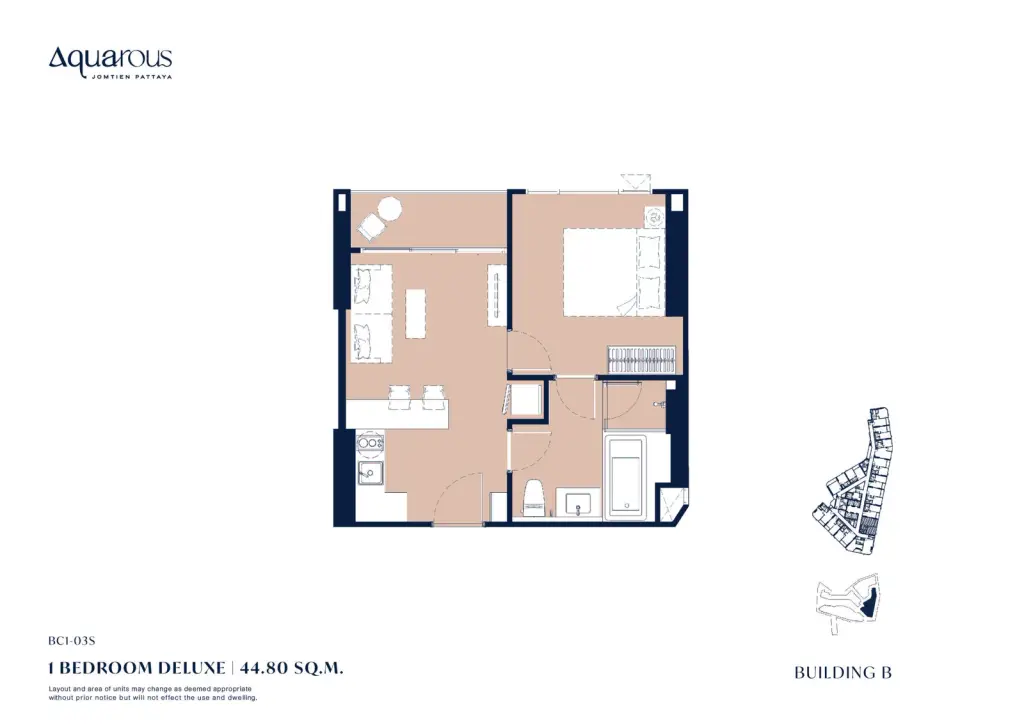 1 Bedroom Condo for Sale at Aquarous Jomtien Pattaya wood-paneled wall with framed art and cream sofa