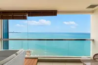 2 Bedroom Condo for Sale at Palm Wongamat modern kitchen with dining area