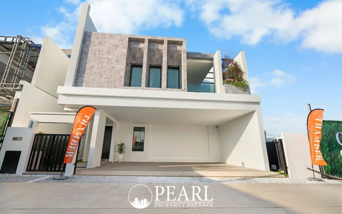 4 Bedroom House for Sale in Thamber Private Pool Villa exterior view with lush garden