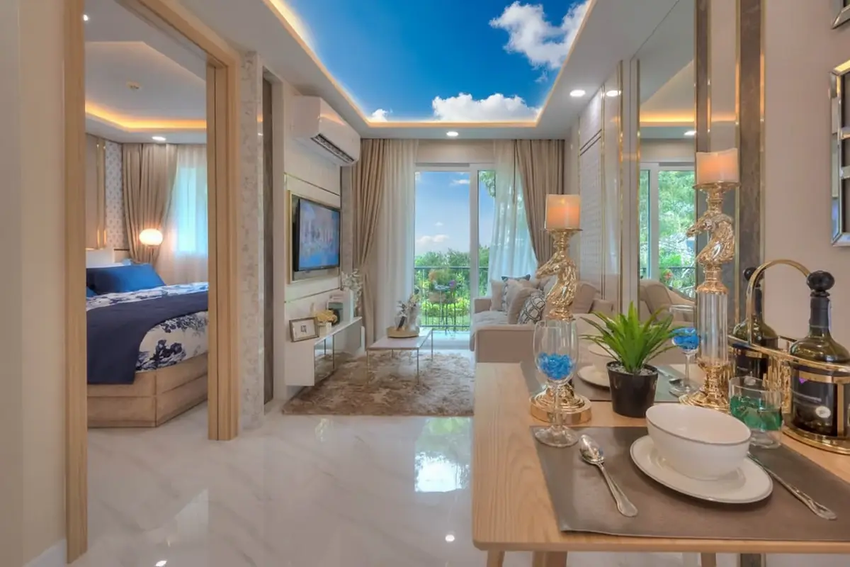 Dusit Grand Park 2 aerial view of multiple residential buildings surrounding a large pool area with landscaping.