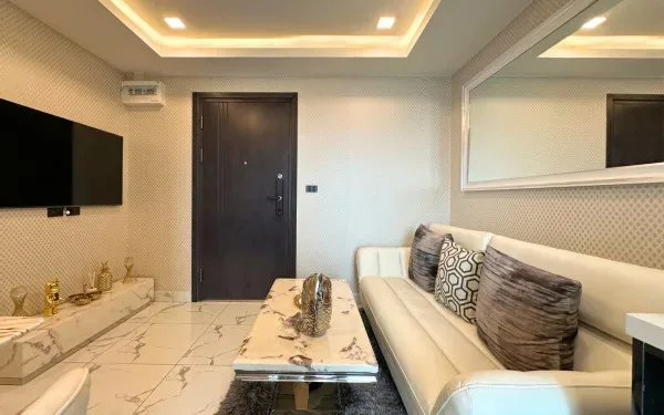 2 Bedroom Condo for Sale in Arcadia Millennium Tower living room with modern furnishings