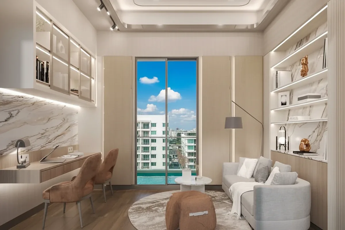 Madcha Le Villa private swimming pool with outdoor seating area and lush landscaping at night.