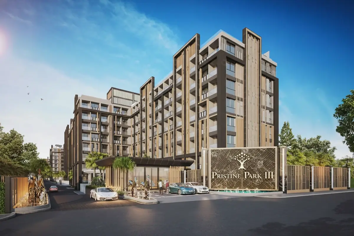 Pristine Park 3 modern condo building exterior with entrance, cars, and a large sign on a sunny day.