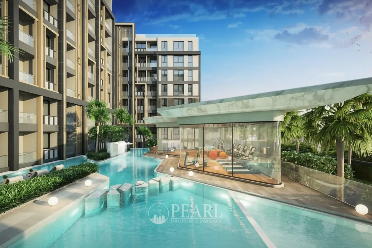 Pristine Park 3 outdoor swimming pool with a glass-enclosed gym building and palm trees.