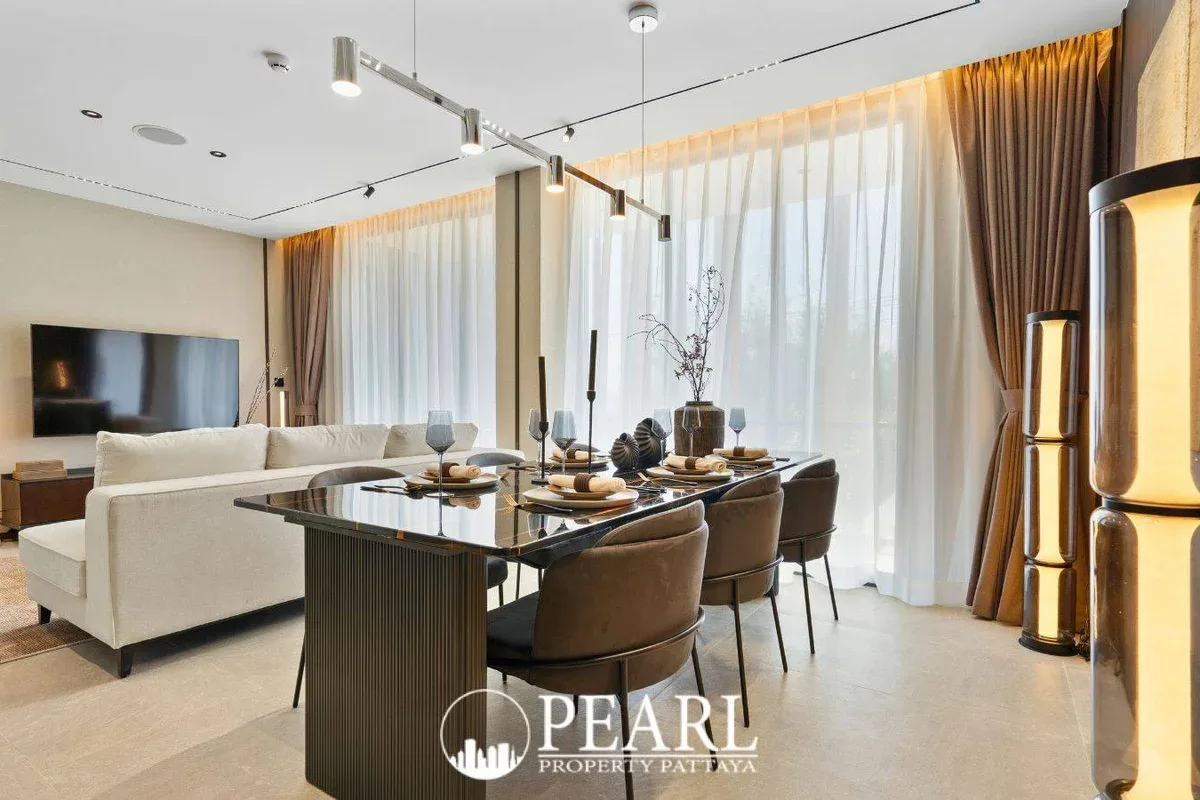 2 Bedroom Condo for Sale in The Panora Estuaria master bedroom with king-size bed and balcony access