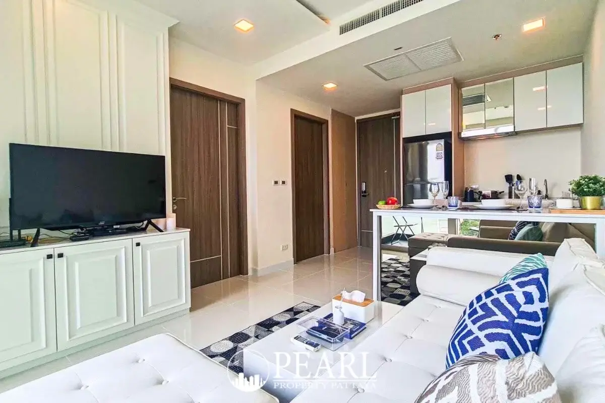 1 Bedroom Condo for Sale in Del Mare living room with sofa and TV
