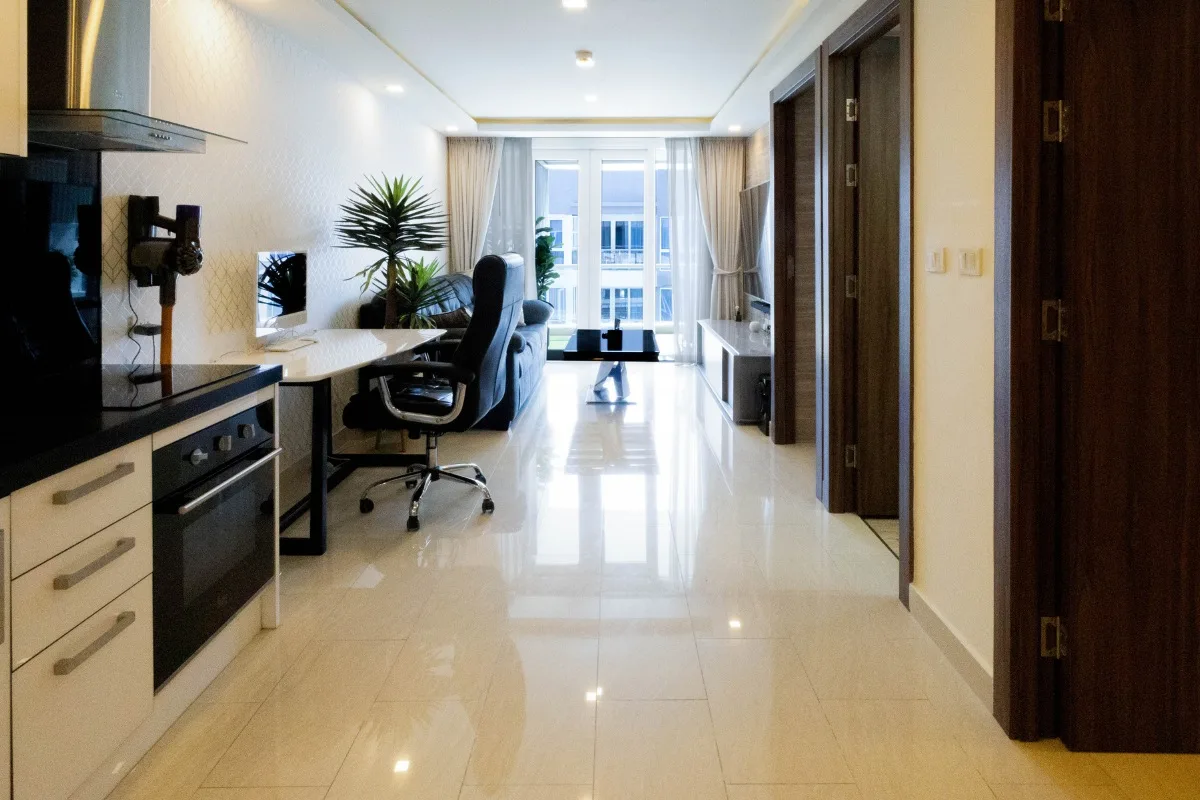 2 Bedroom Condo for Sale at Grand Avenue Residence: View from kitchen down hallway to living room and balcony.