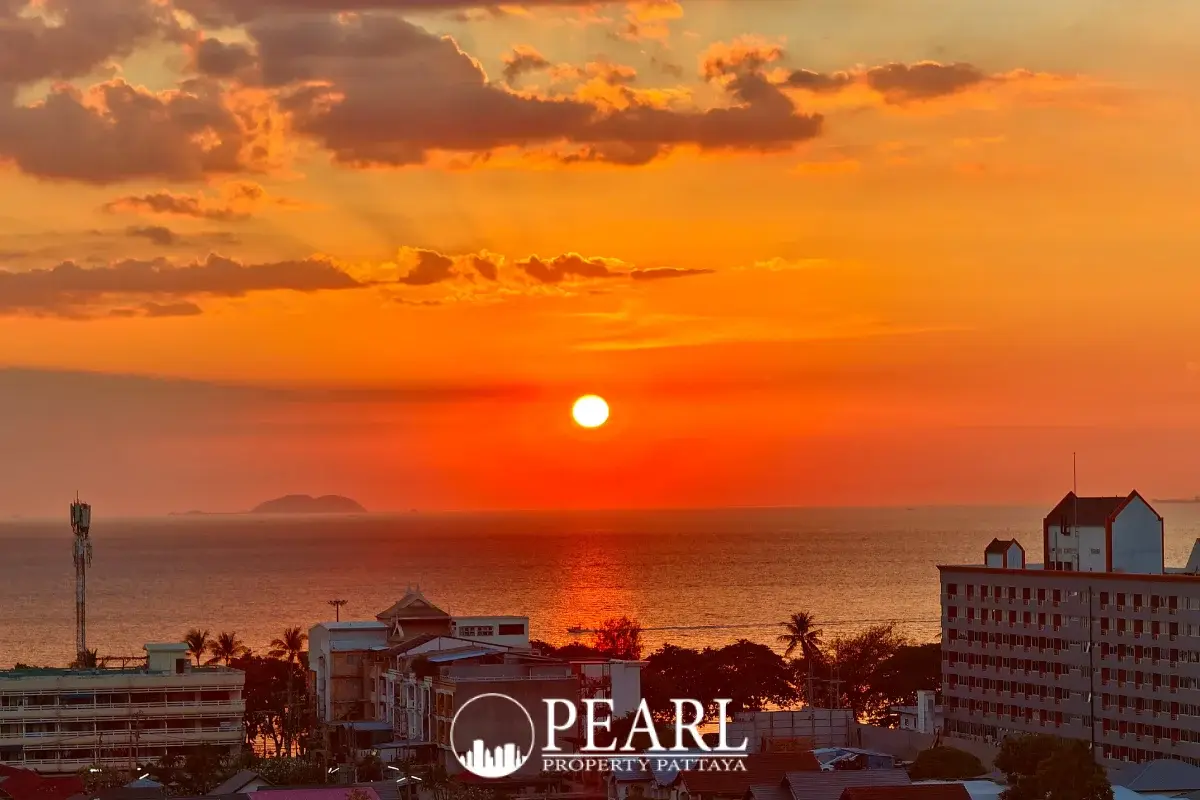 1 Bedroom Condo for Sale in Riviera Ocean Drive master bedroom with king-size bed and balcony access