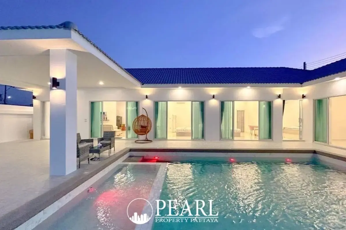 5 Bedroom House for Sale in Thamber Private Pool Villa exterior view with lush landscaping